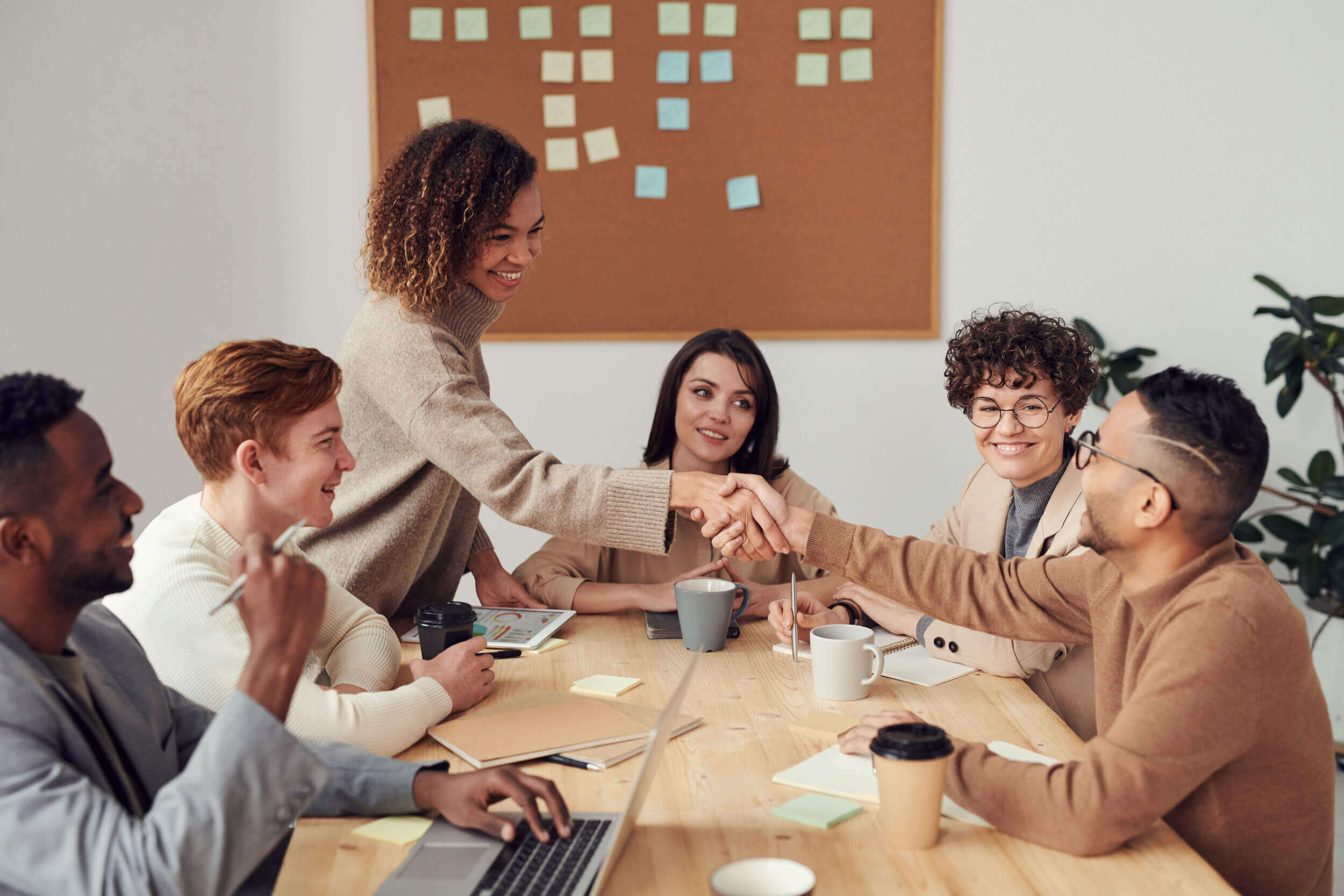 A group of people sitting at a table