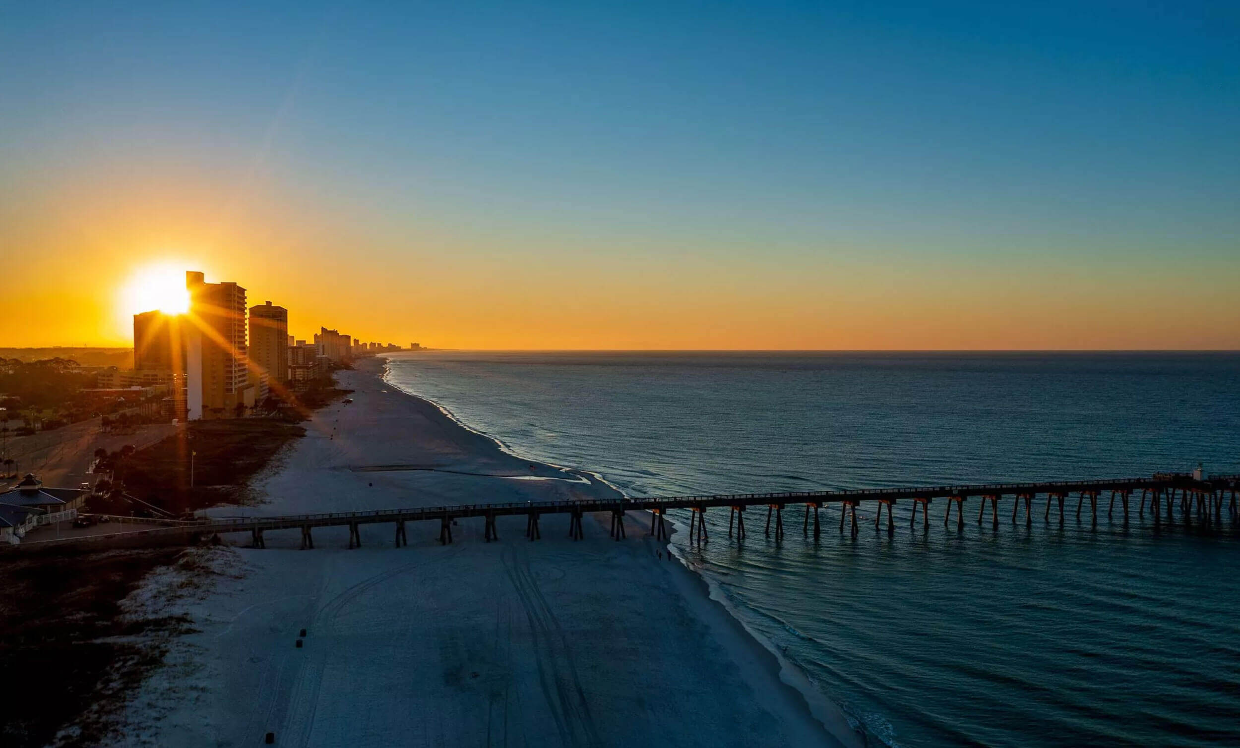 A sunset over a body of water