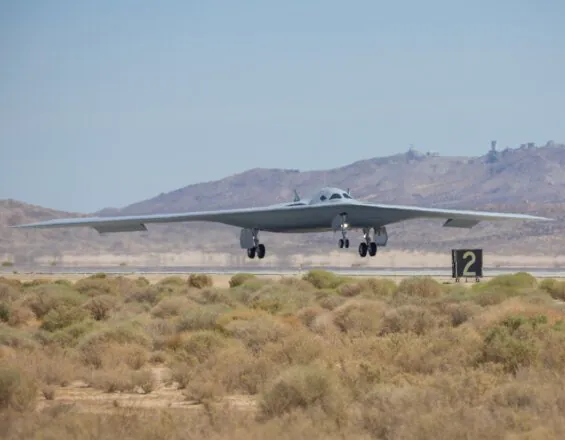 Air Force photo of B-21 landing on airstrip at Edwards Air Force Base