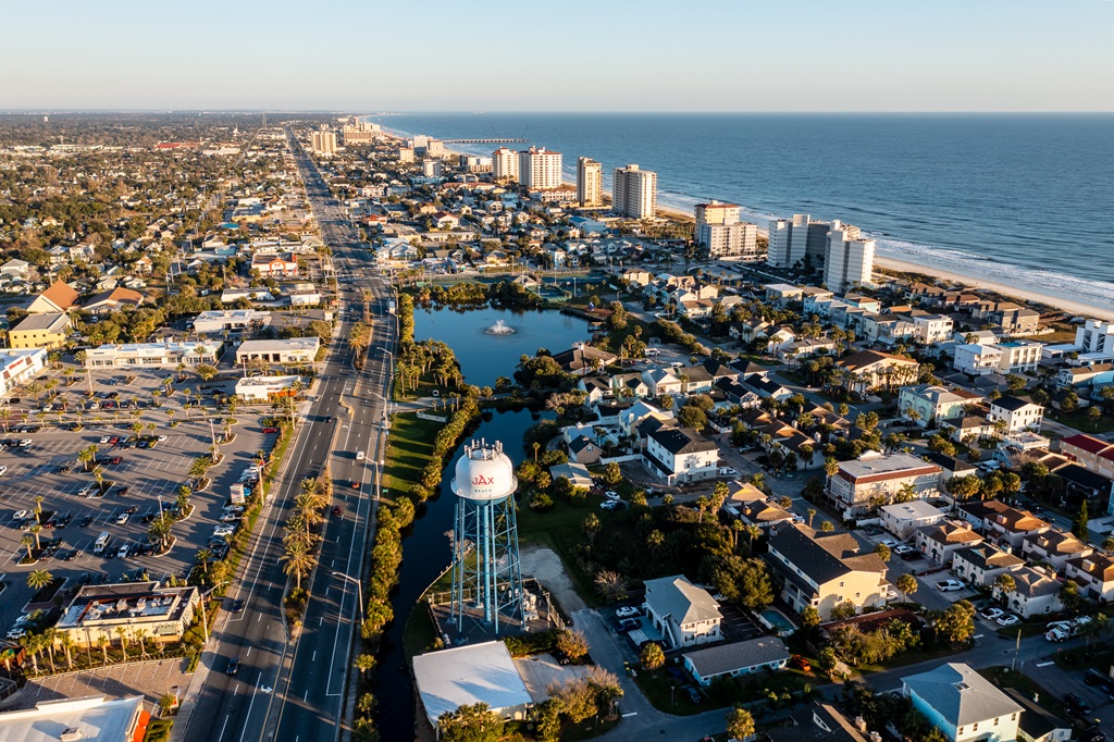Aerial view of Jacksonville Beach with city in foreground and ocean in distance