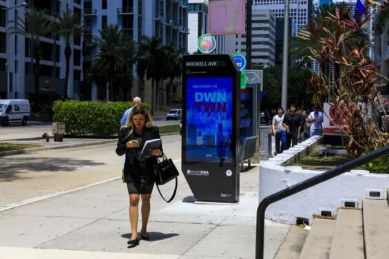 A person walking through Miami's Brickell area