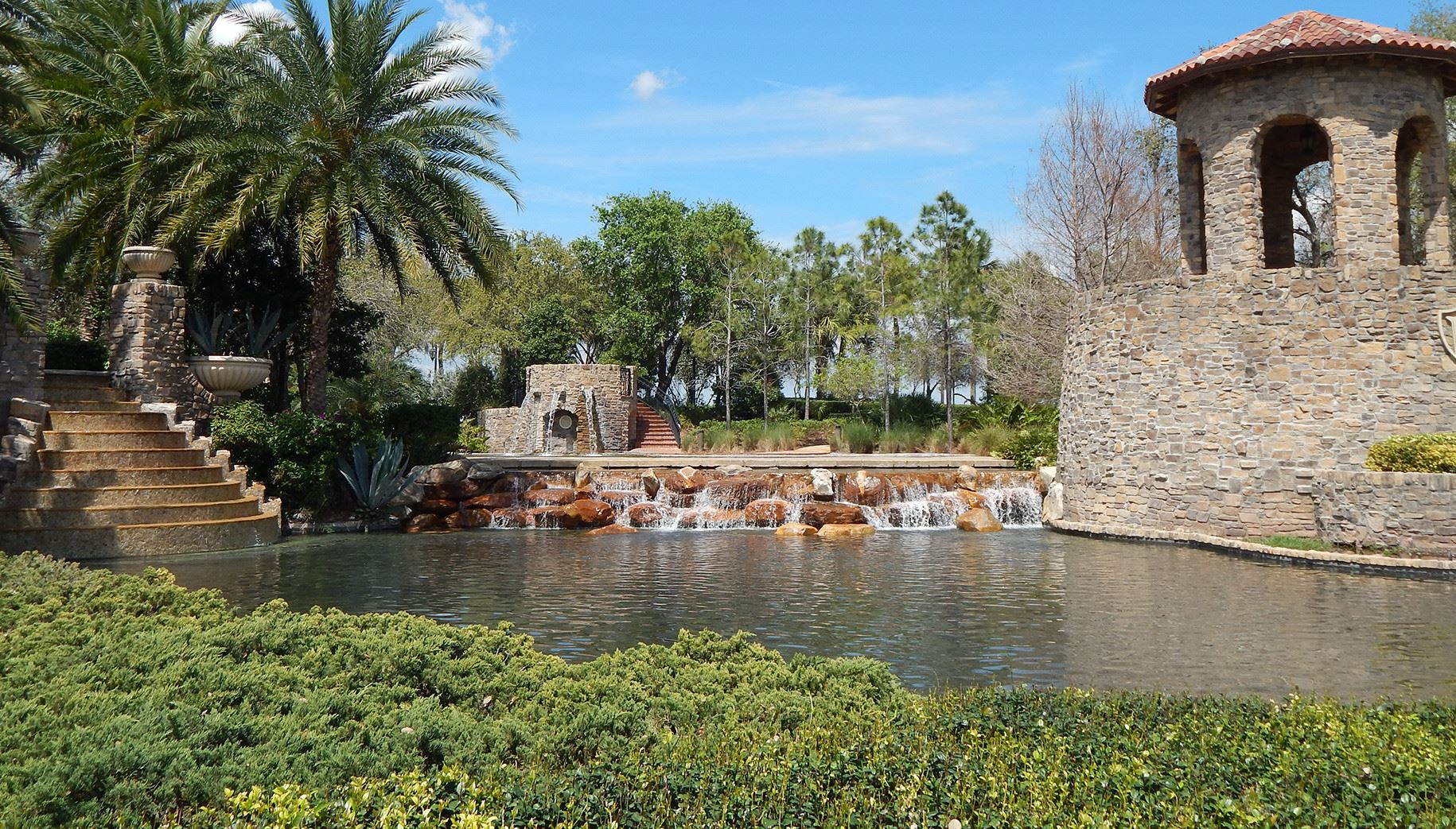 A man-made waterfall and gazebo in the Parkland community